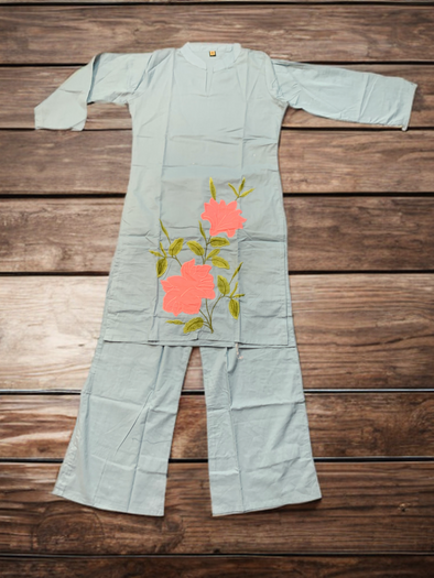 Women Light Blue Kurta Set With a Pink Floral Embroidery.