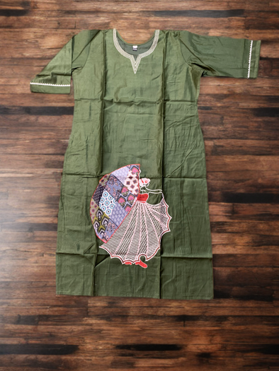 Attractive Women Kurta In A Green Shade With Embroidery.
